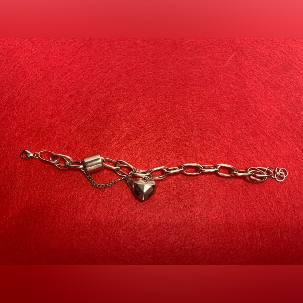 2/$13 Silver tone bracelet with heart charm
